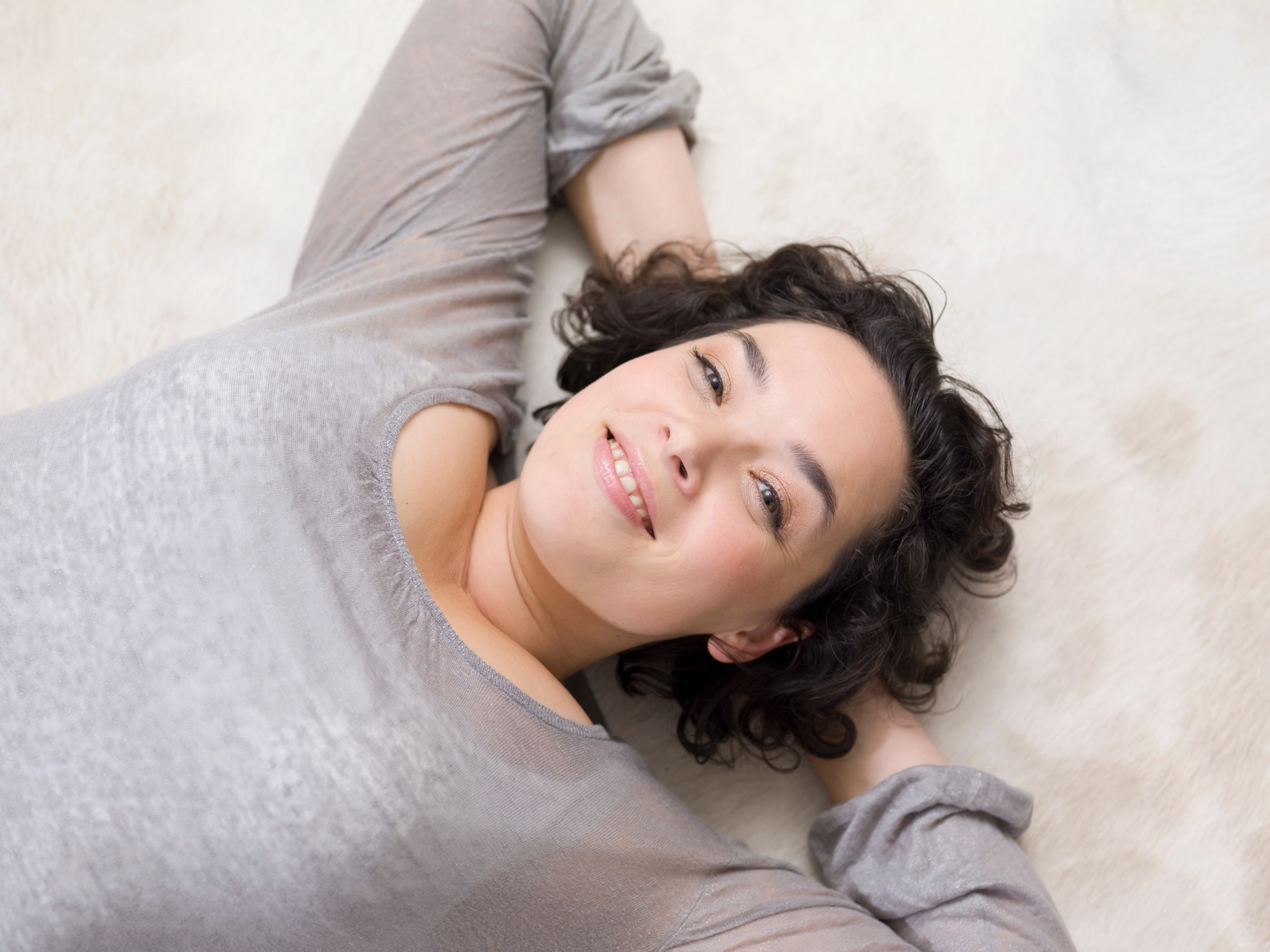 one-woman-relaxing-on-the-floor-2025-04-04-08-08-52-utc